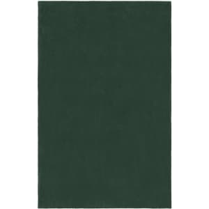 A dark green microfibre fleece blanket XL with a soft texture, suitable for home use. It has a logo on the corner.