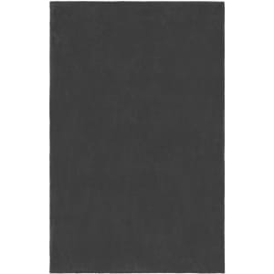 A microfibre fleece blanket in a solid dark grey colour, featuring a smooth texture and edged finish.