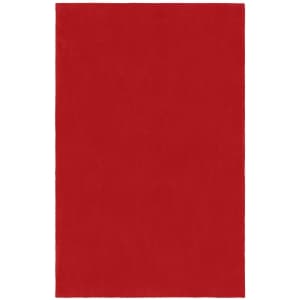 A red microfibre fleece blanket XL with a smooth texture, featuring a small logo.