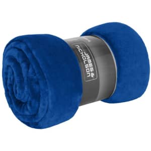 A blue microfibre fleece blanket rolled neatly, featuring a branded sleeve.
