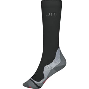 A pair of black and grey compression socks with a logo, featuring a distinctive design and knee-length fit.