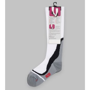 Compression socks in white and grey with a black design, featuring a hanging tag with product information.