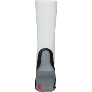 A pair of compression socks in white with black and grey accents, featuring a logo on the sole.