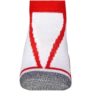 A pair of white sneaker socks featuring red accents and a textured grey sole. The design includes a bold pattern.