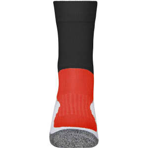 A pair of sport socks featuring black, red, and white colours, with a padded grey area on the sole.