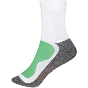 A pair of sports socks featuring a white upper, grey heel, and green cushioning. The design includes a logo.