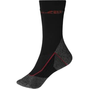 Black and grey work socks with cushioning and a logo on the cuff, designed for warmth and comfort.