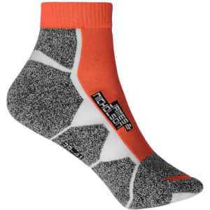 Sport sneaker socks featuring grey and orange colours with a branded logo. Designed for comfort and style.