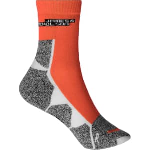 Sport socks in orange and grey with a patterned design and a logo at the top.