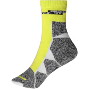 A pair of sport socks featuring bright yellow and grey design, with a branded logo on the upper.