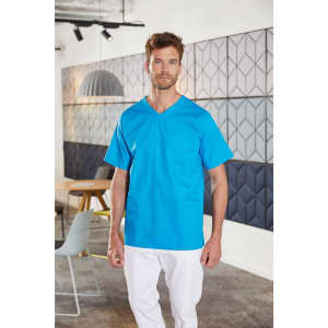 A blue men's tunic is shown, featuring a V-neck and short sleeves, worn with white pants. It has a logo on it.