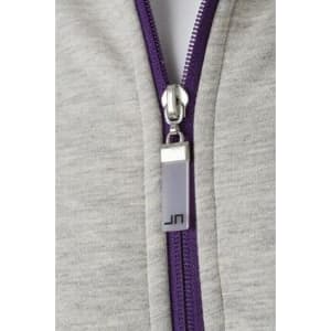 A grey jacket featuring a purple zipper and a logo on the zipper pull.