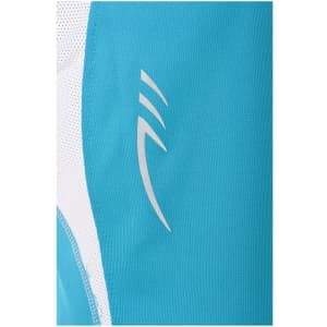 A close-up of a turquoise T-shirt featuring a silver logo on the fabric. The shirt has a breathable texture.