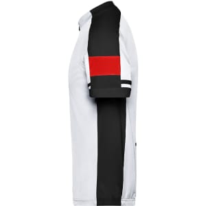 A men's full zip shirt in white, black, and red with a logo on the chest. Features bold colour block design.
