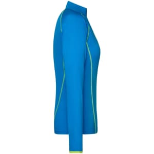 A blue long-sleeved ladies sports shirt with green accents and a collar. It features a logo on the garment.
