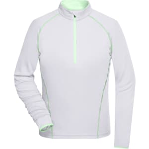A light grey ladies' sports shirt with a zip neck and green accent stitching. It features long sleeves and a logo.