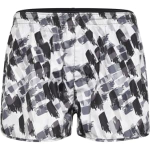 A pair of ladies' sports shorts in a black and white brushstroke pattern, featuring an elastic waistband and a logo.