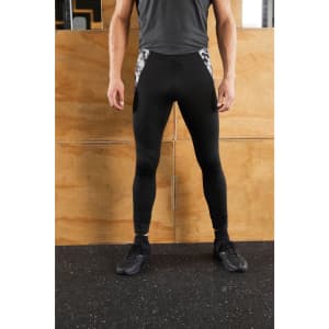 Men's black sports tights with a patterned panel on the sides, displayed on a person standing upright.