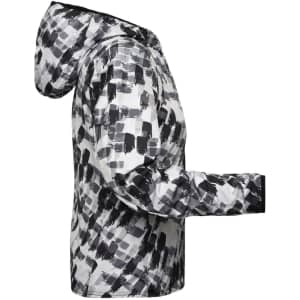 A soft shell ladies' sports jacket in a black and white abstract pattern, featuring a hood and a logo.