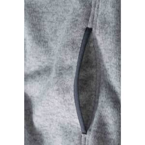 A grey knitted fleece hoodie featuring a stylish side pocket with a contrasting trim.