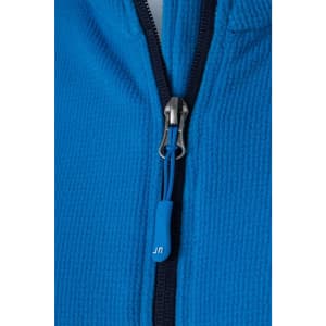 A close-up of a blue fleece jacket featuring a zip and a zip puller. The jacket has a logo visible.