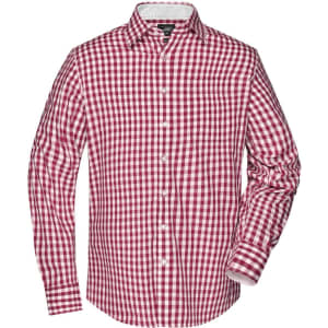 A red and white checked button-up shirt with long sleeves and a collar, featuring a logo on the label.