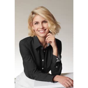 A black button-up shirt with a checked collar, modelled by a smiling woman with blonde hair.