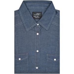 A denim blouse in a deep blue colour, featuring a button-up front and two chest pockets. It has a logo on the label.
