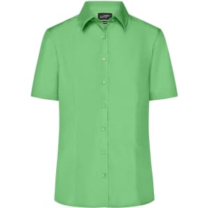 A short-sleeved button-up shirt in a vibrant green colour with a collar and row of buttons down the front.