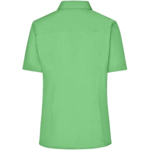 A short-sleeved button-up ladies business shirt in a vibrant green colour, featuring a simple design and back yoke.