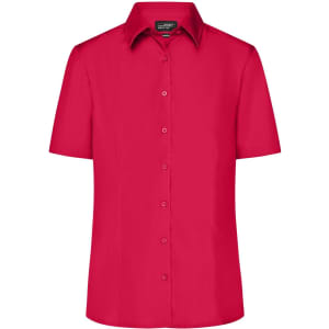 A short-sleeved ladies button-up shirt in vibrant pink, featuring a collar and a series of buttons.