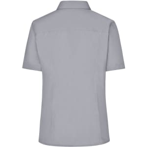 A light grey short-sleeved ladies business shirt with a button-up design and a subtle logo on the back.