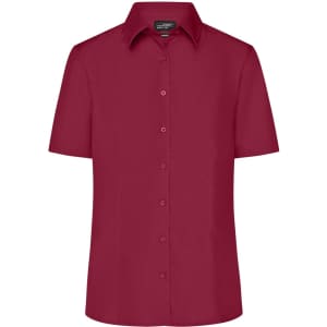 A short-sleeved ladies' business shirt in a rich burgundy colour with a button-up front and collar.