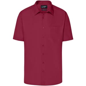 A short-sleeved, button-up men's business shirt in a deep burgundy colour, featuring a front pocket and a logo.