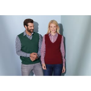 A green and a burgundy ladies' v-neck vest are worn over checkered shirts. The image features two smiling models.