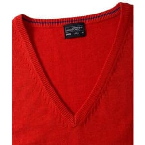A red v-neck vest made from knitted fabric, featuring a simple design and a tag inside.