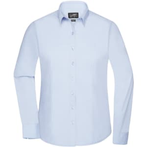 A light blue ladies button-up shirt with long sleeves and a classic collar, featuring a logo.