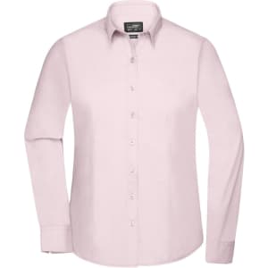A ladies long-sleeve button-up shirt in soft pink, featuring a collar and button front, with a logo on the tag.
