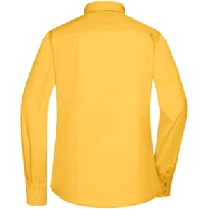 A yellow ladies button-up shirt with long sleeves and a collar, featuring a logo on the back.