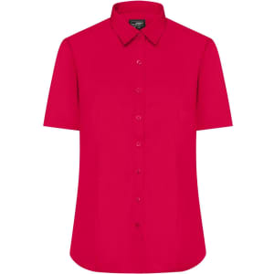 A button-up shirt in a vibrant pink colour with short sleeves and a classic collar. It features a logo.