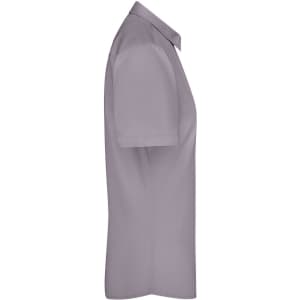 A short-sleeved ladies button-up shirt in a soft grey colour, featuring a collar and a logo.