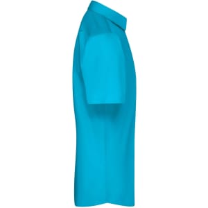 A blue short-sleeve button-up shirt in a side view, featuring a collar and an attached logo.