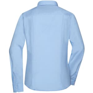 A light blue ladies button-up shirt with long sleeves and a collar, featuring a logo on the back.