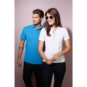A blue men's Pima polo shirt and a white women's polo shirt are displayed on a light purple background.