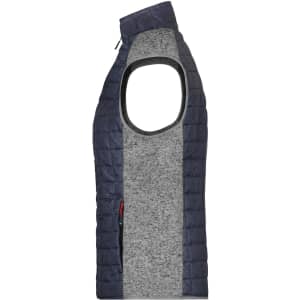 A ladies' knitted hybrid vest featuring a navy blue quilted design and a grey knitted centre panel. It has no sleeves.
