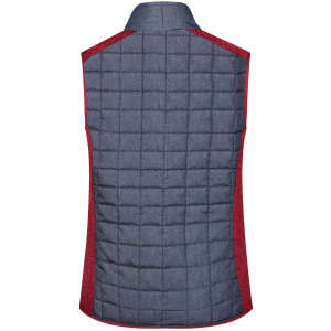 A ladies' knitted hybrid vest in navy with red detailing, featuring a textured, quilted design on the back.