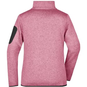 A ladies' knitted fleece jacket in a soft pink hue with a black patch on the sleeve and a high collar.