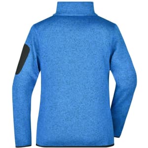 A blue knitted fleece jacket with a high collar and a black patch on the sleeve, featuring a logo.