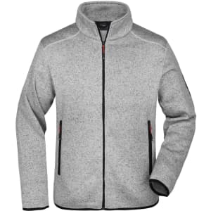 A grey knitted fleece jacket featuring a high collar and zippered pockets, with a logo on the sleeve.