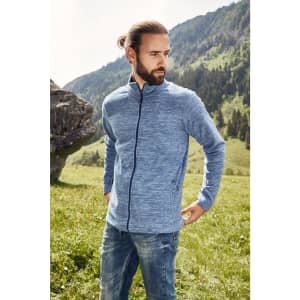 A men's polar fleece jacket in blue, featuring a zip closure and side pockets, worn outdoors against a natural backdrop.